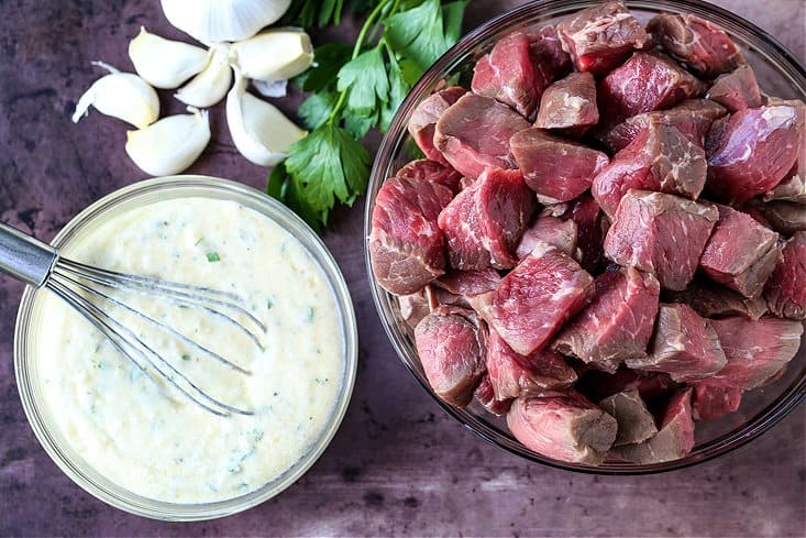 Ingredients for making steak bites with garlic butter sauce