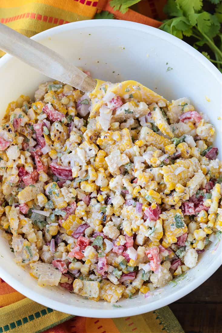 Mexican street corn salad in a white bowl
