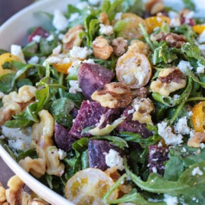 arugula salad with feta, beets, walnuts and tomatoes