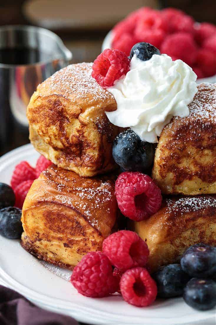 Hawaiian Roll French Toast with berries and whipped cream