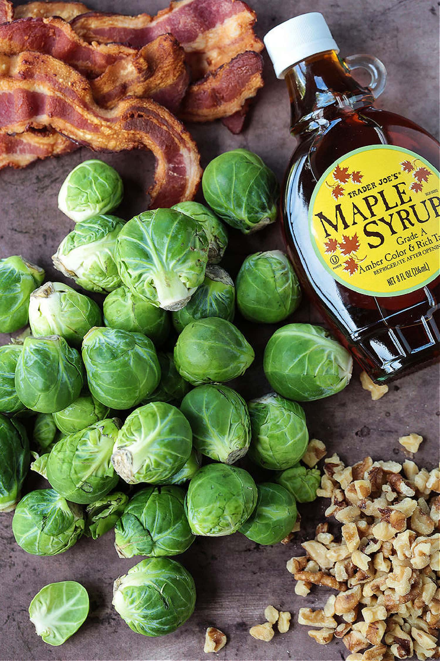 These Maple Bacon Brussels Sprouts have the perfect balance of sweet and salty! An easy to make, one pan vegetable side dish! ingredients to make maple bacon brussels sprouts