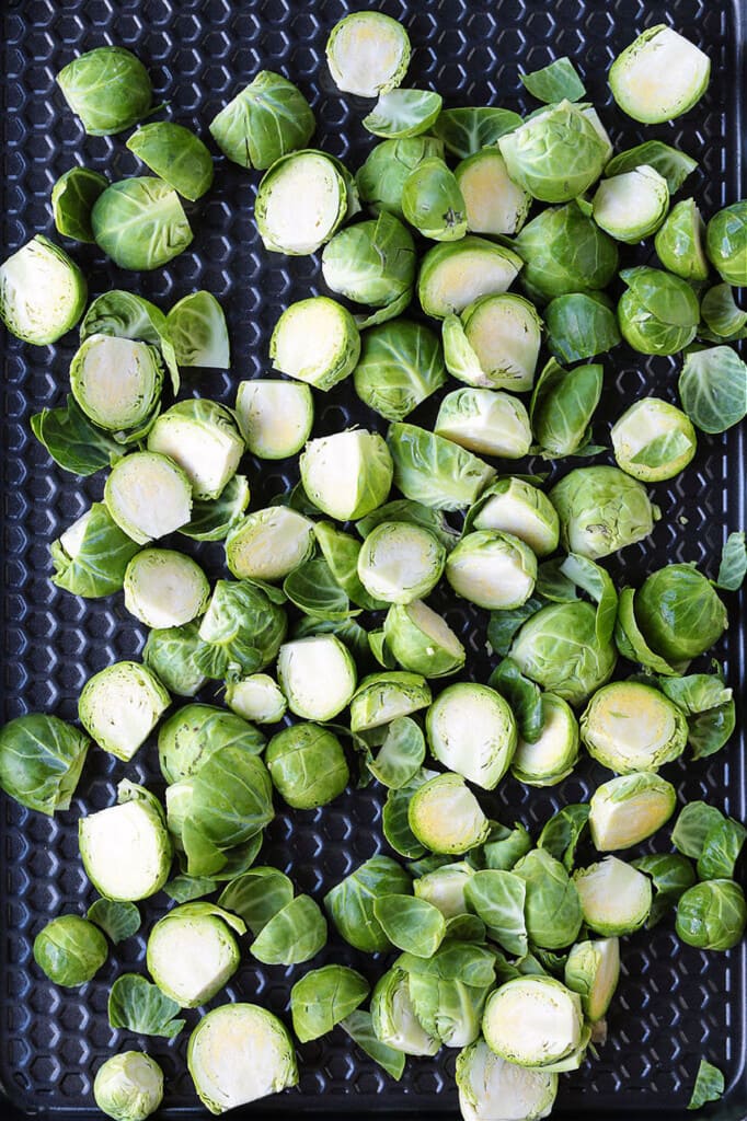sliced brussels sprouts on a sheet pan