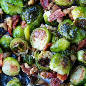 brussels sprouts with bacon and walnuts on a sheet pan