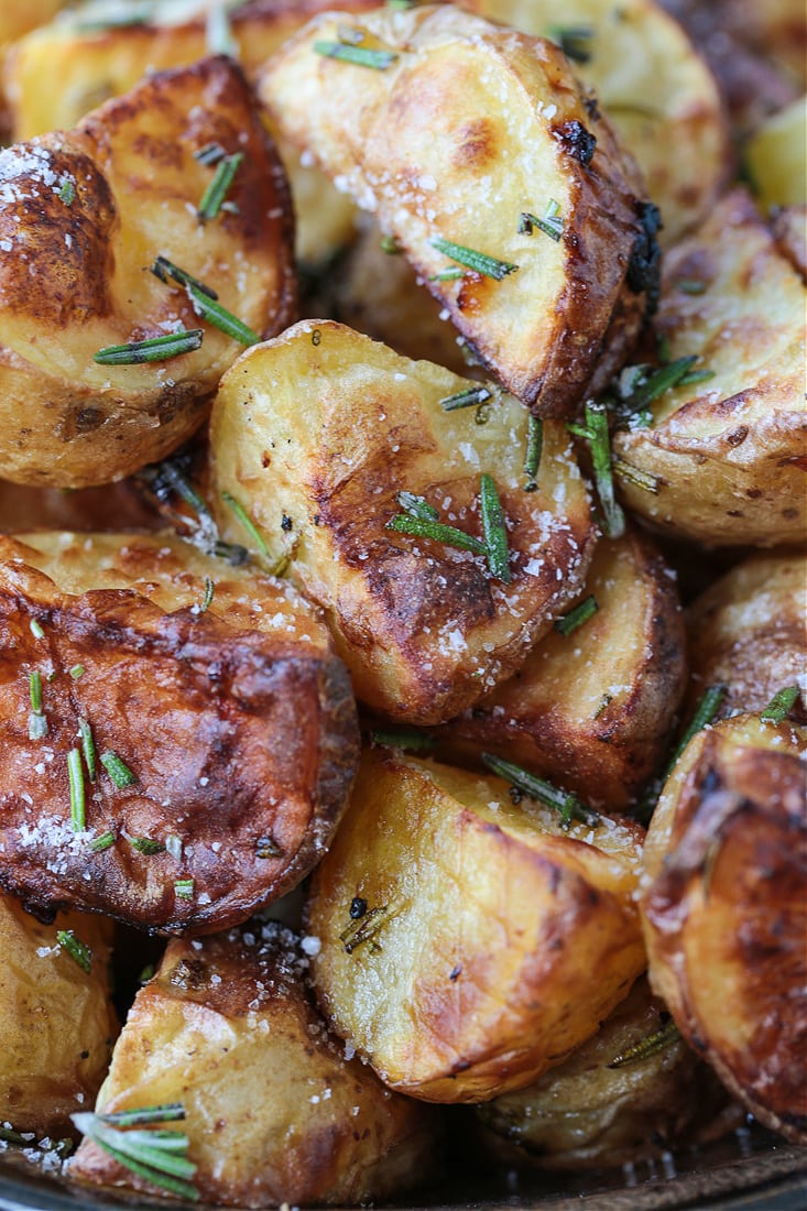 These Air Fryer Baby Potatoes are so crispy on the outside and tender and fluffy on the inside! A 15 minute, healthy side dish! crispy, air fried potatoes with fresh rosemary