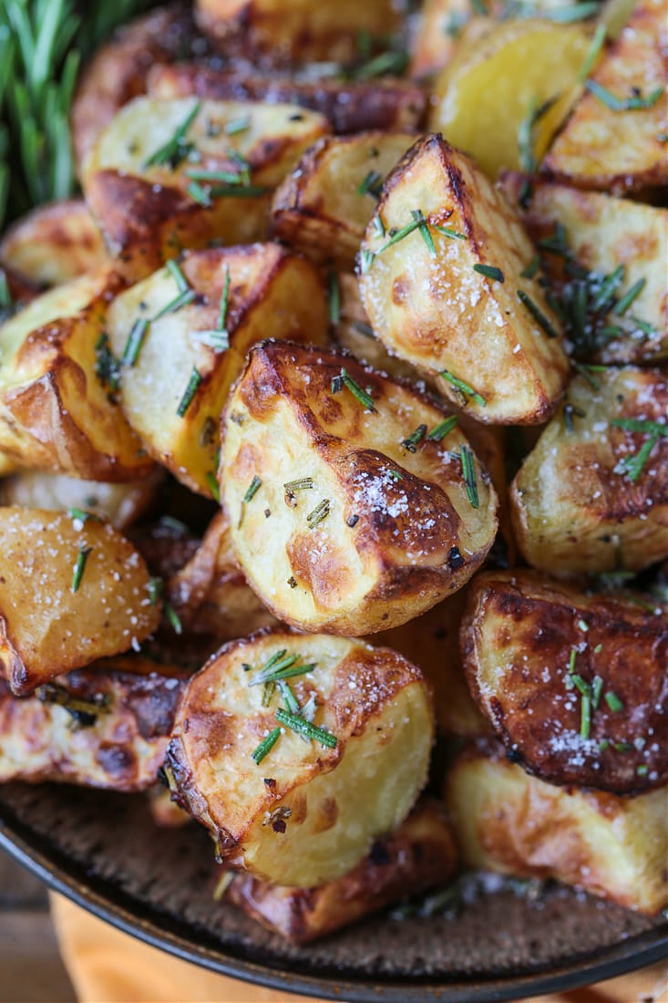 These Air Fryer Baby Potatoes are so crispy on the outside and tender and fluffy on the inside! A 15 minute, healthy side dish! Air Fryer baby potatoes with salt and fresh rosemary