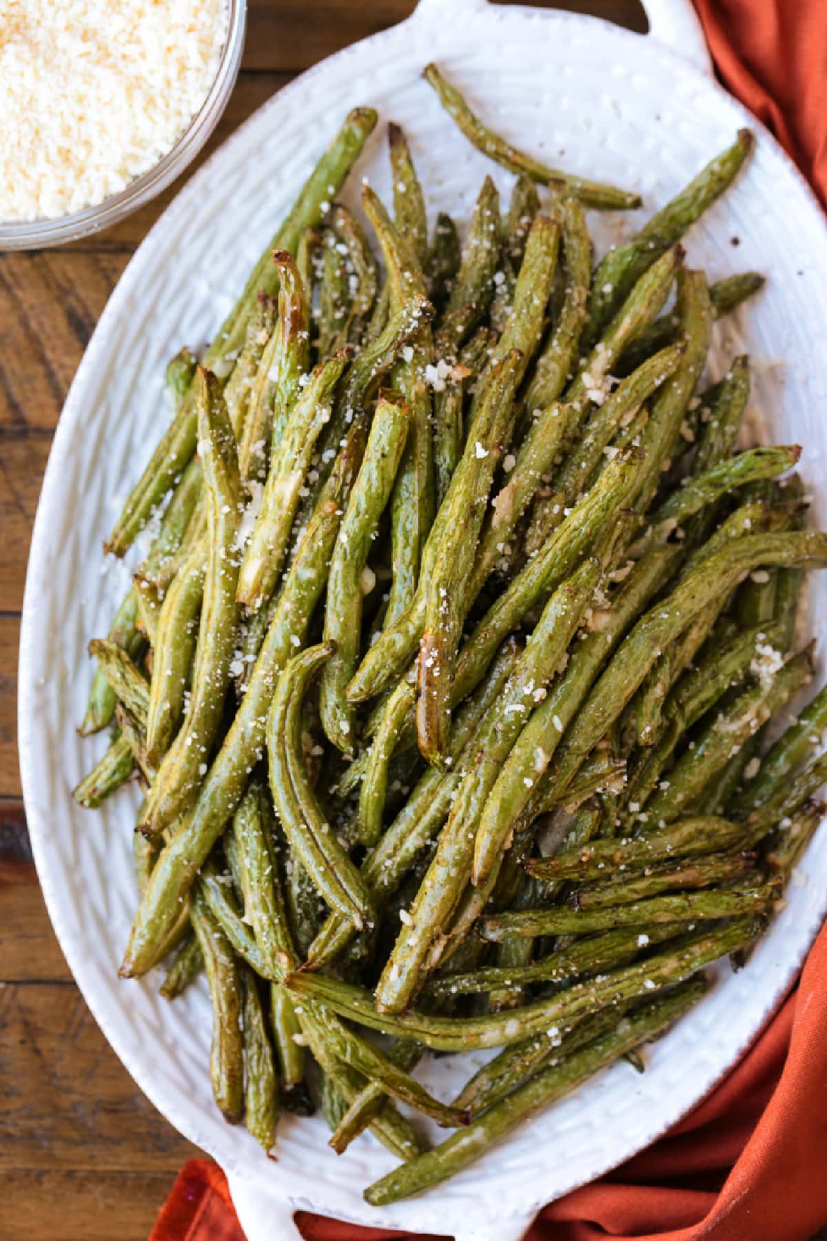 green beans on a platter with napkin on the side