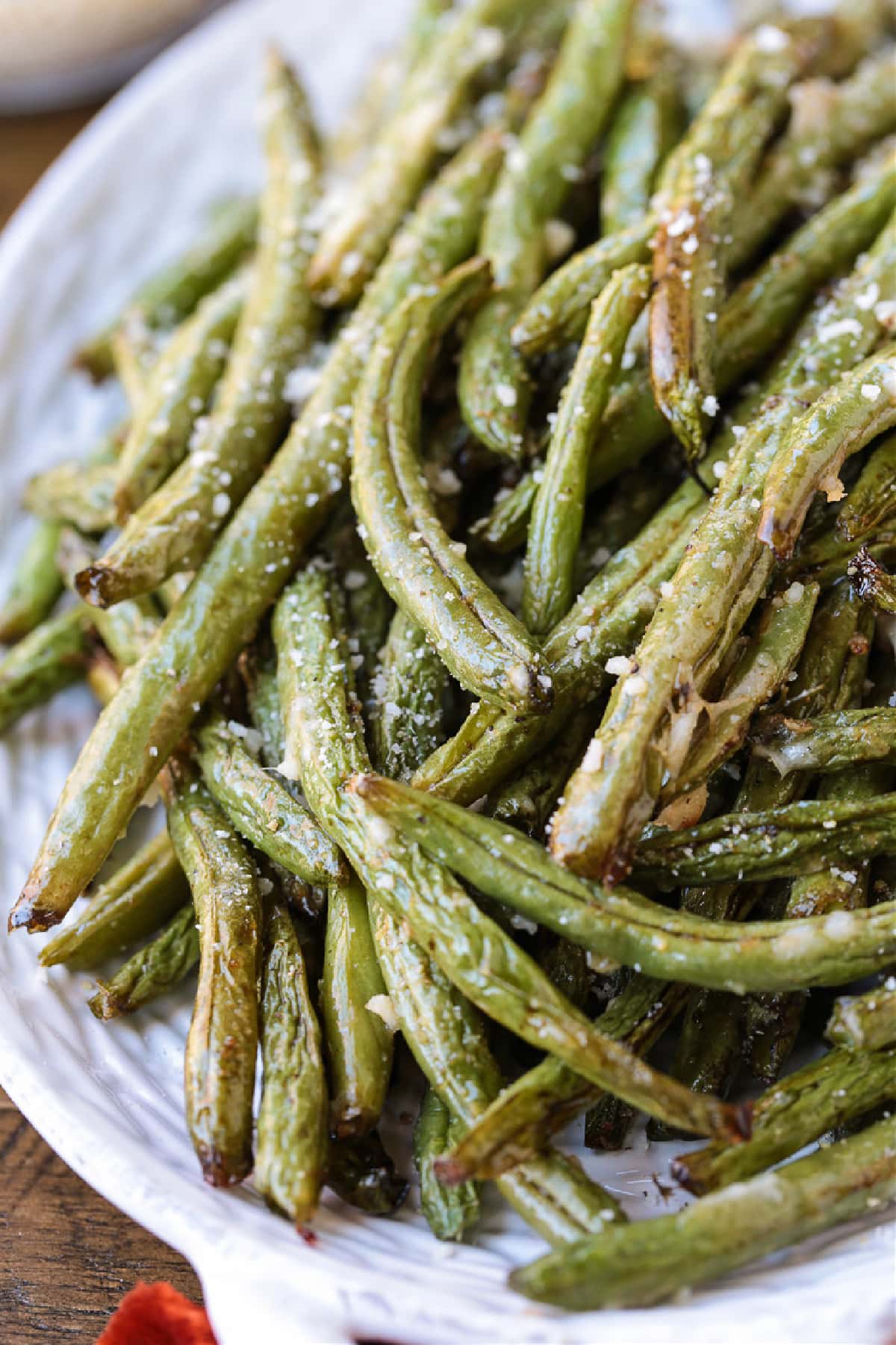 air fryer green beans on white platter