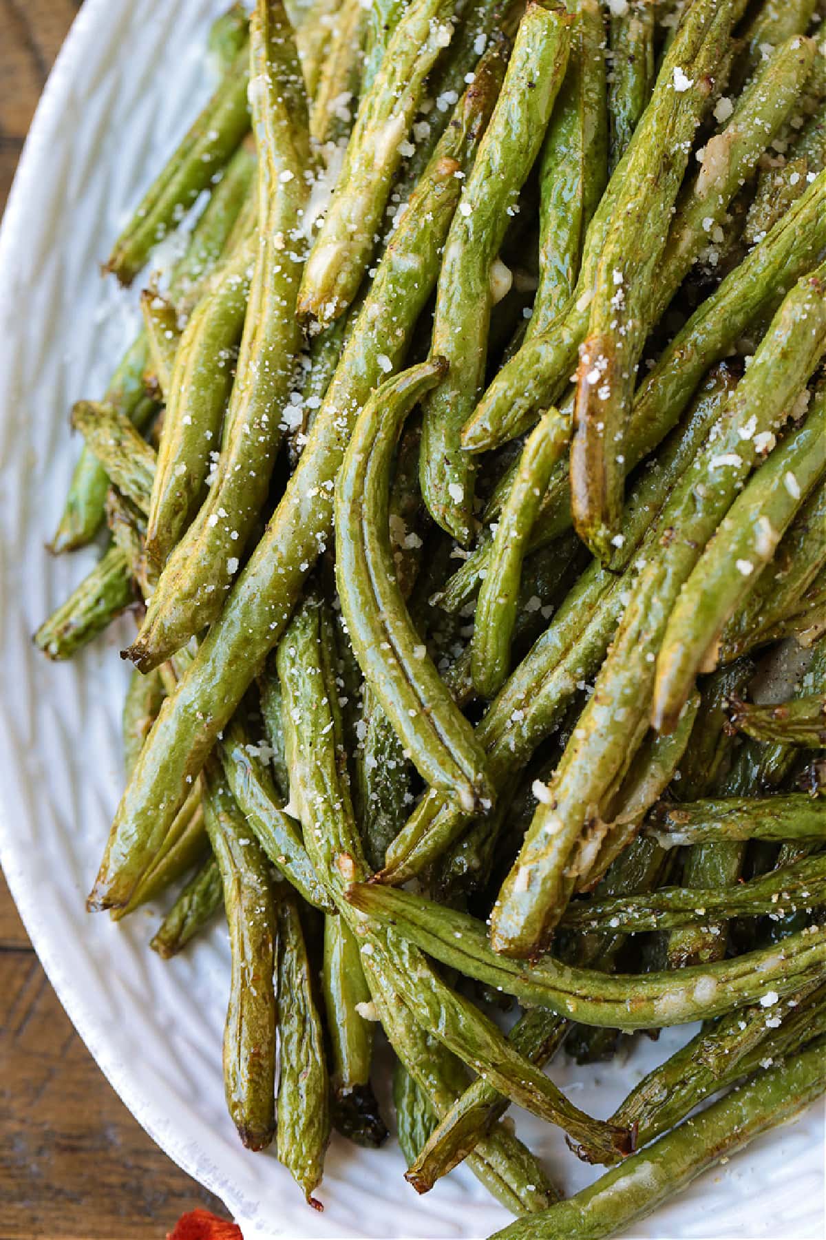 air fryer green beans on white platter