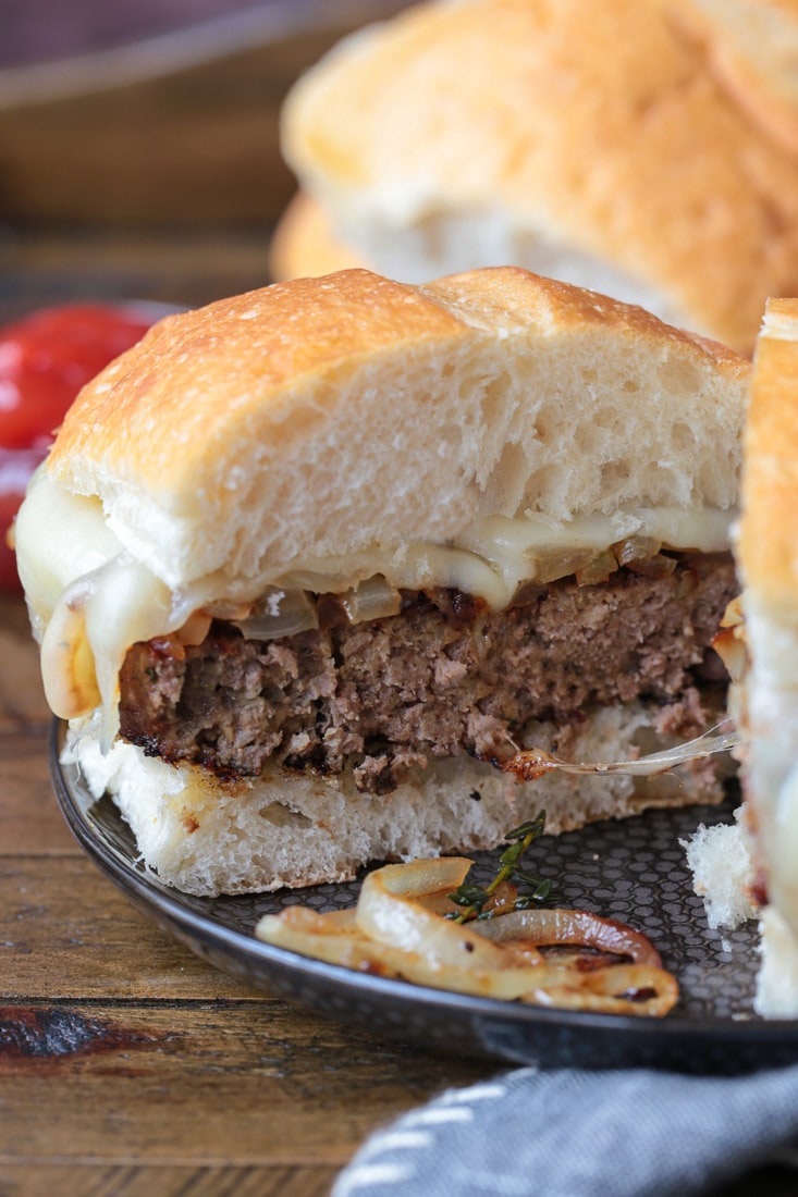 meatloaf sandwich cut in half on a plate