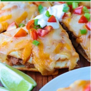 mexican pizza cut into wedges on cutting board