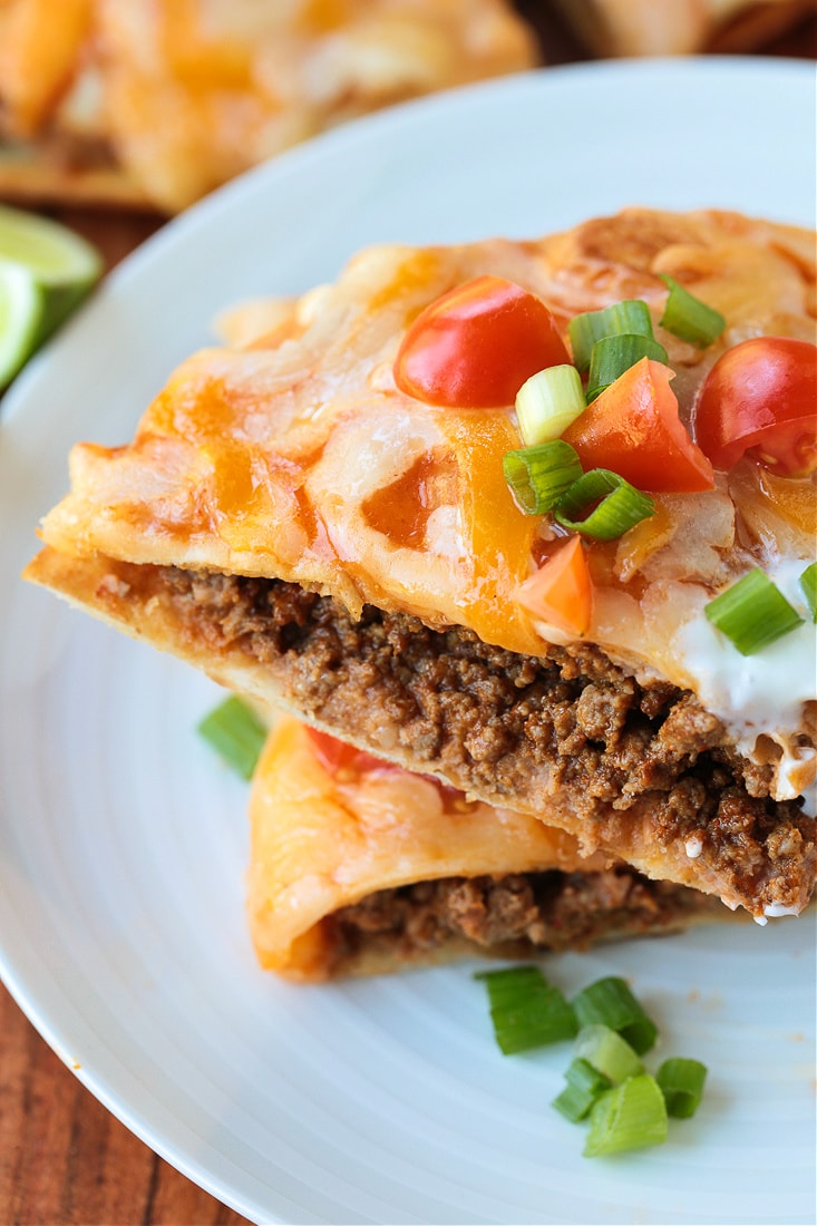 taco bell mexican pizza stacked on a plate