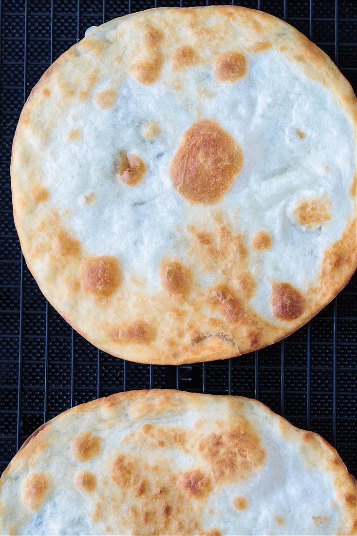 crispy fried tortillas on a wire rack