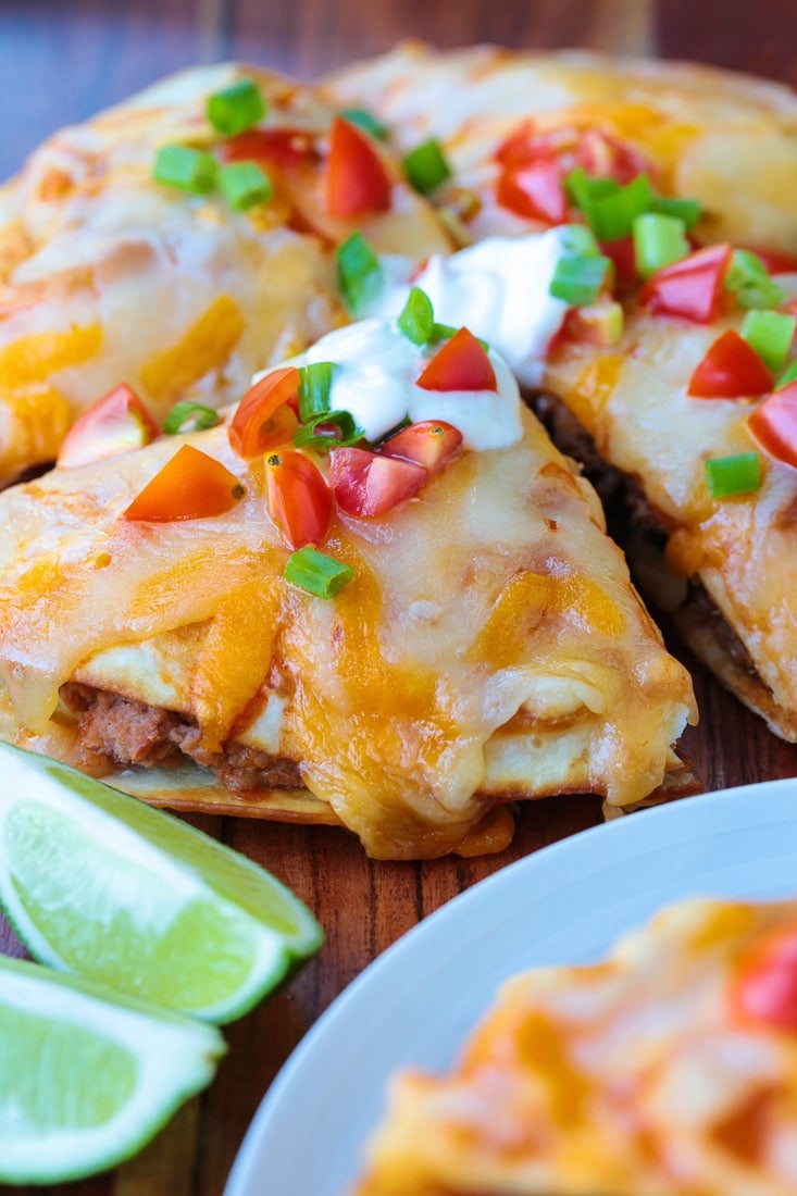 mexican pizza cut into wedges