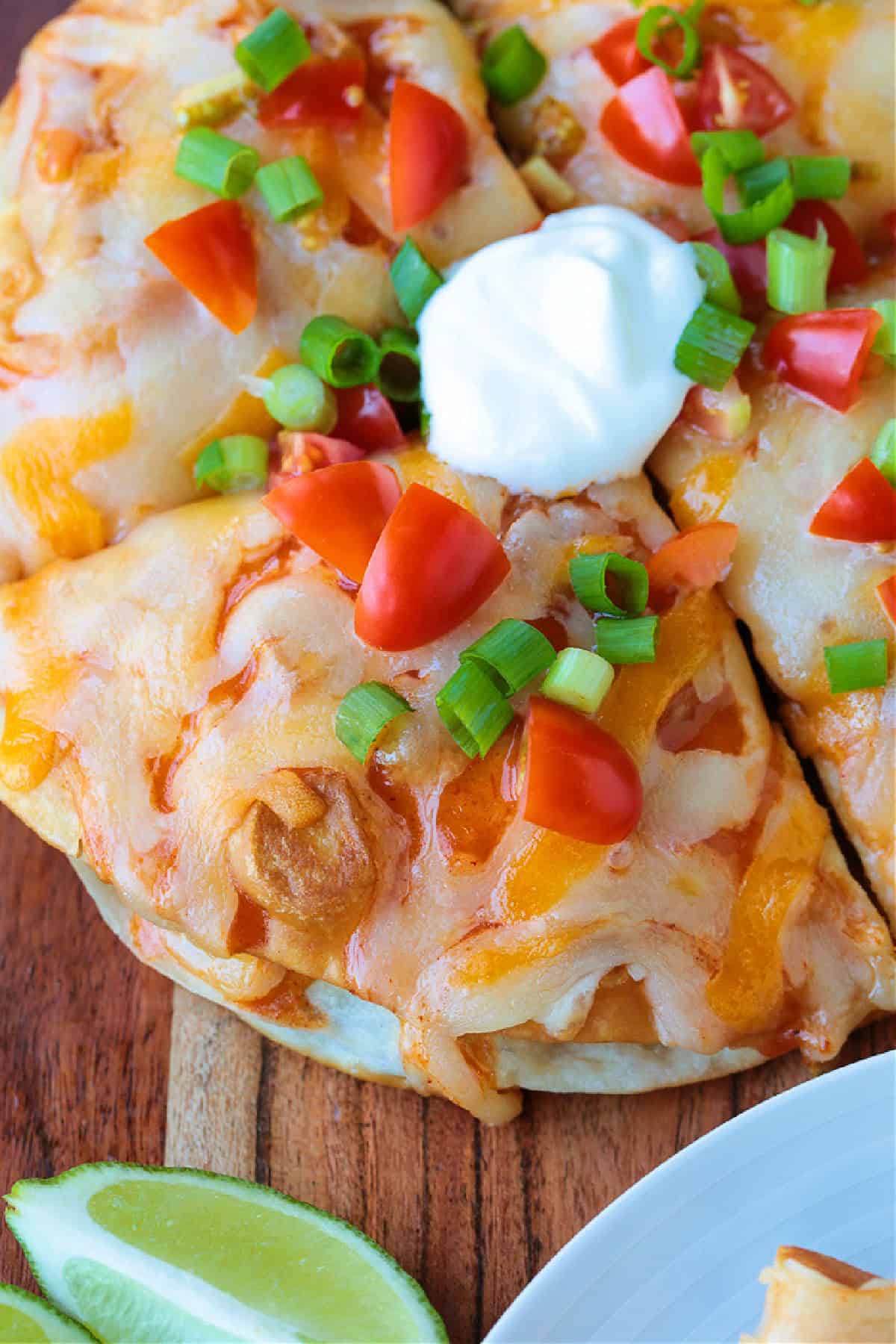 mexican pizza with tomatoes and sour cream