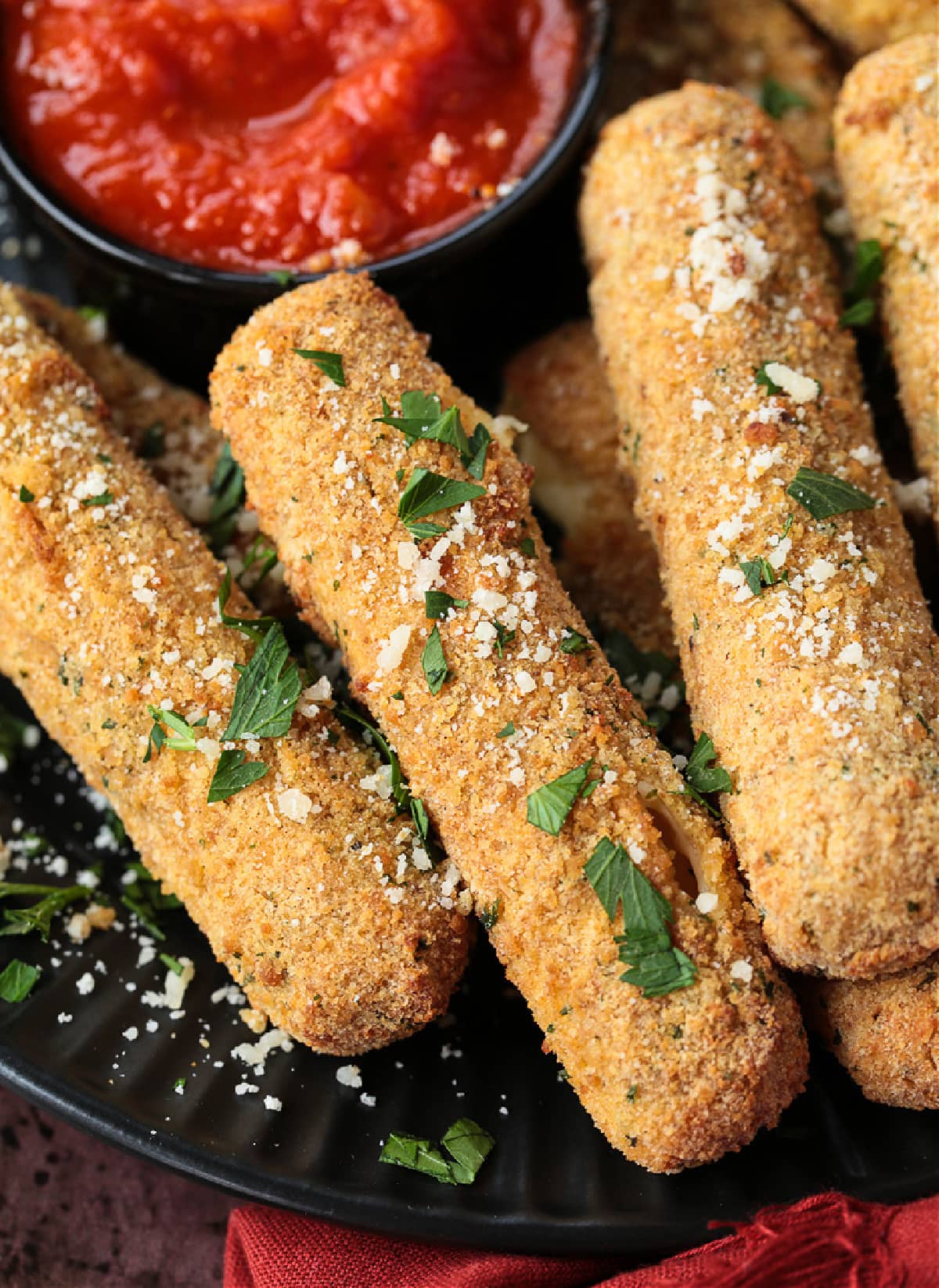 Air Fryer Mozzarella Sticks turn out fabulously crispy without any oil! Brown and crispy on the outside and cheese-pull worthy on the inside! mozzarella sticks made in an air fryer