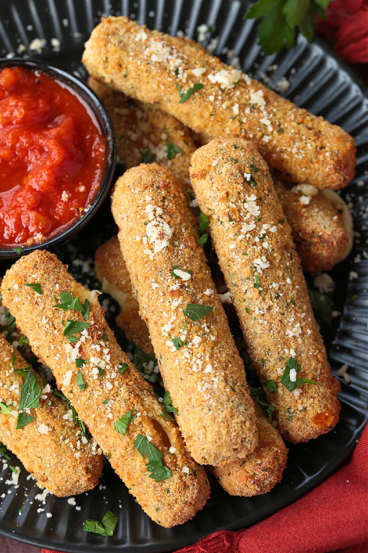 Air Fryer Mozzarella Sticks turn out fabulously crispy without any oil! Brown and crispy on the outside and cheese-pull worthy on the inside! mozzarella sticks made in an air fryer