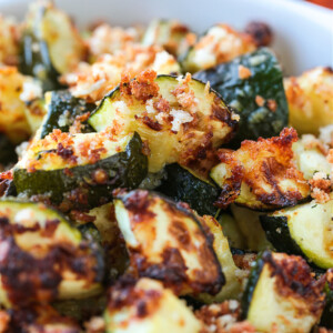 A close up of air fryer zucchini in an oven dish