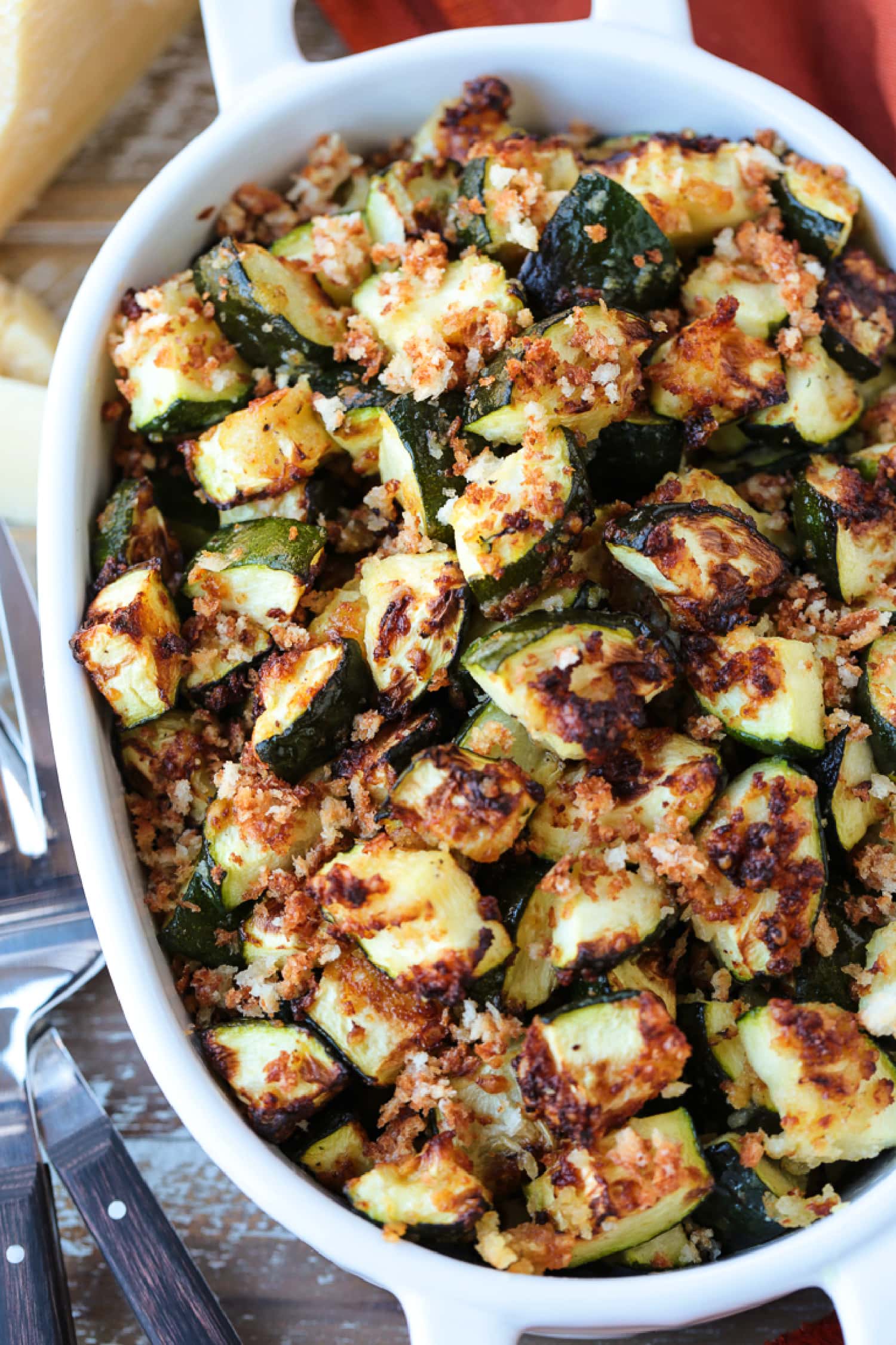 Close up of an oval baking dish filled with air fryer zucchini