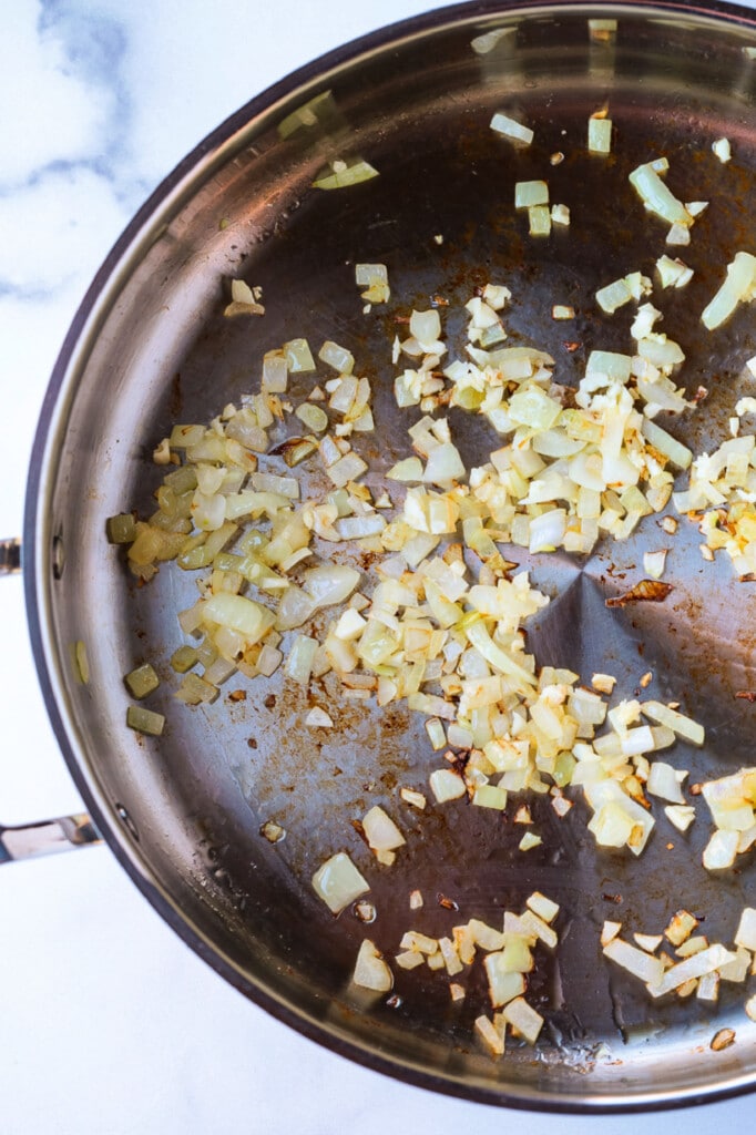 onions cooking in a skillet