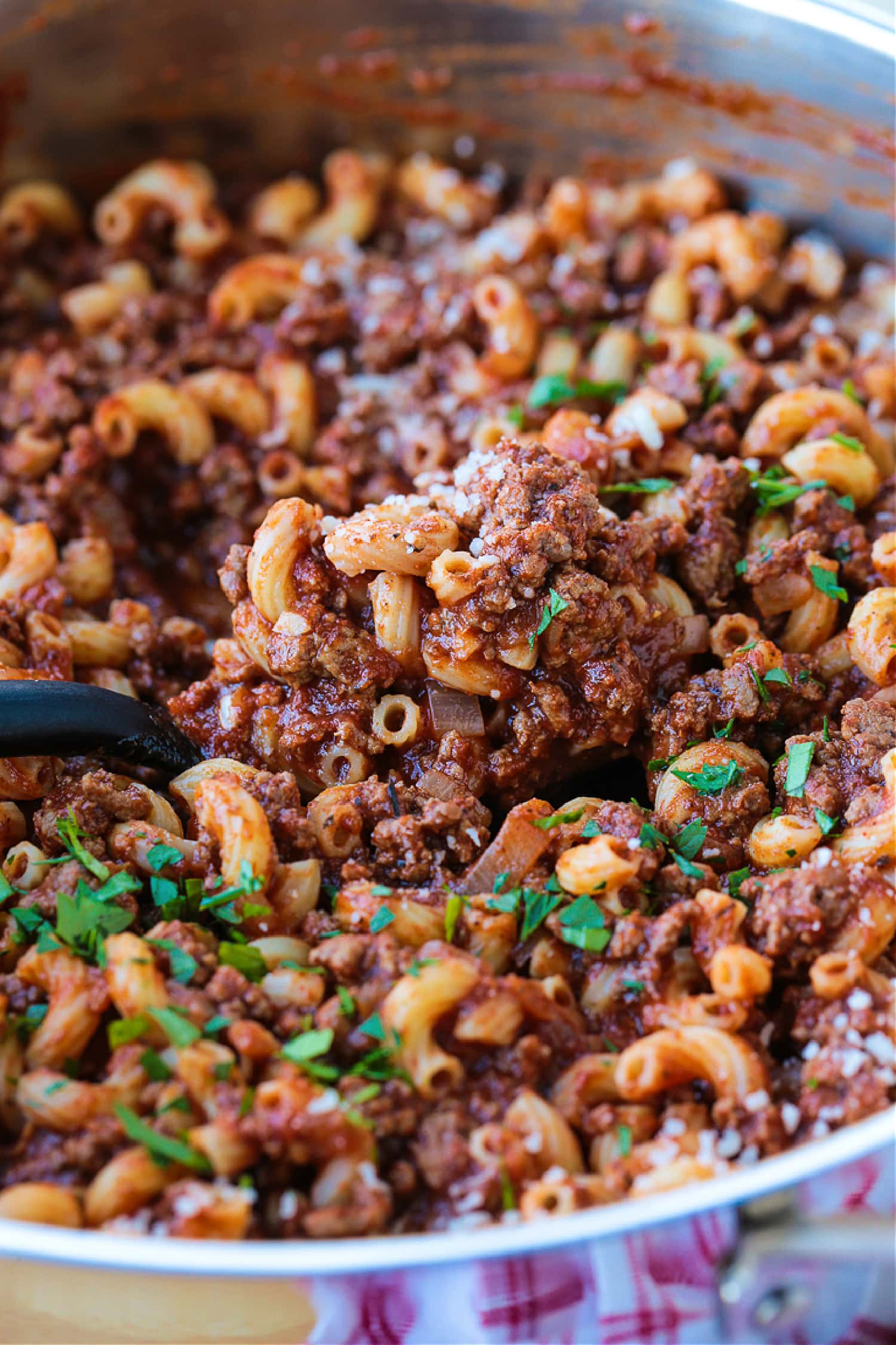 beefaroni in skillet with spoon