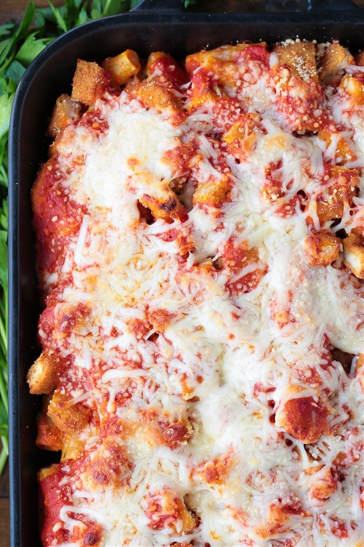 chicken and pasta casserole baked with cheese on top