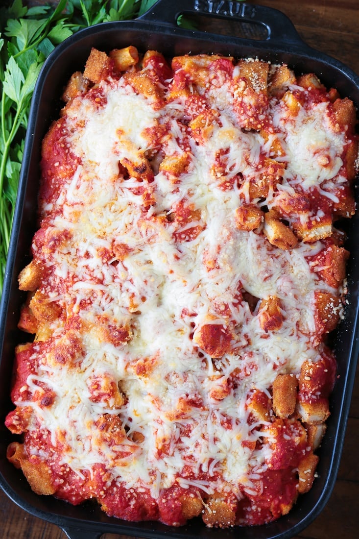 Casserole layered with pasta, chicken nuggets and cheese