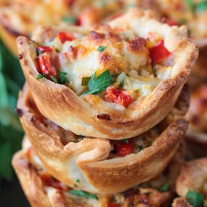 crab puffs stacked on a plate