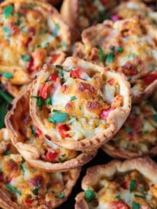 crab puff appetizers stacked on plate