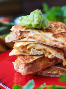 chicken quesadillas with guacamole on top