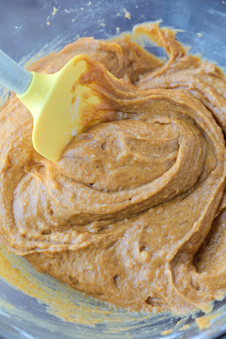 batter in a bowl with yellow spatula