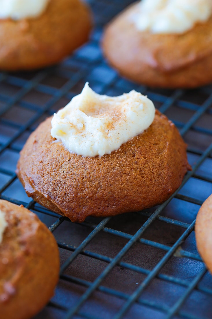 pumpkin thumbprint cookies on wire rack