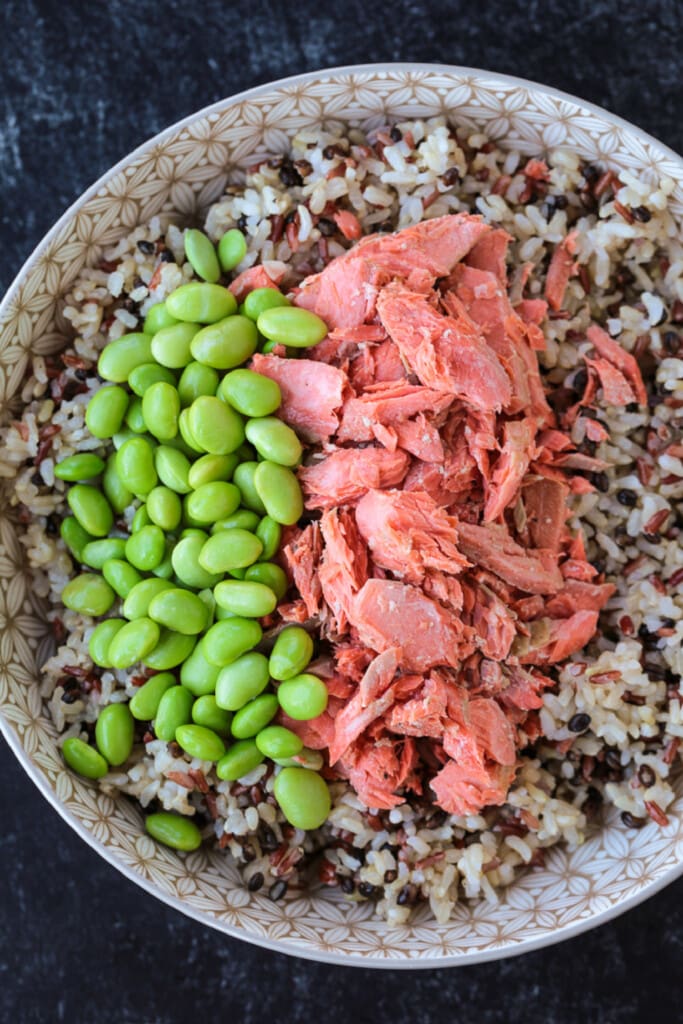 salmon and edamame in a bowl with rice