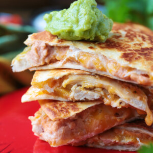 chicken quesadillas with guacamole on top