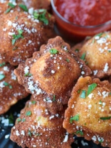 fried ravioli with marinara sauce on the side