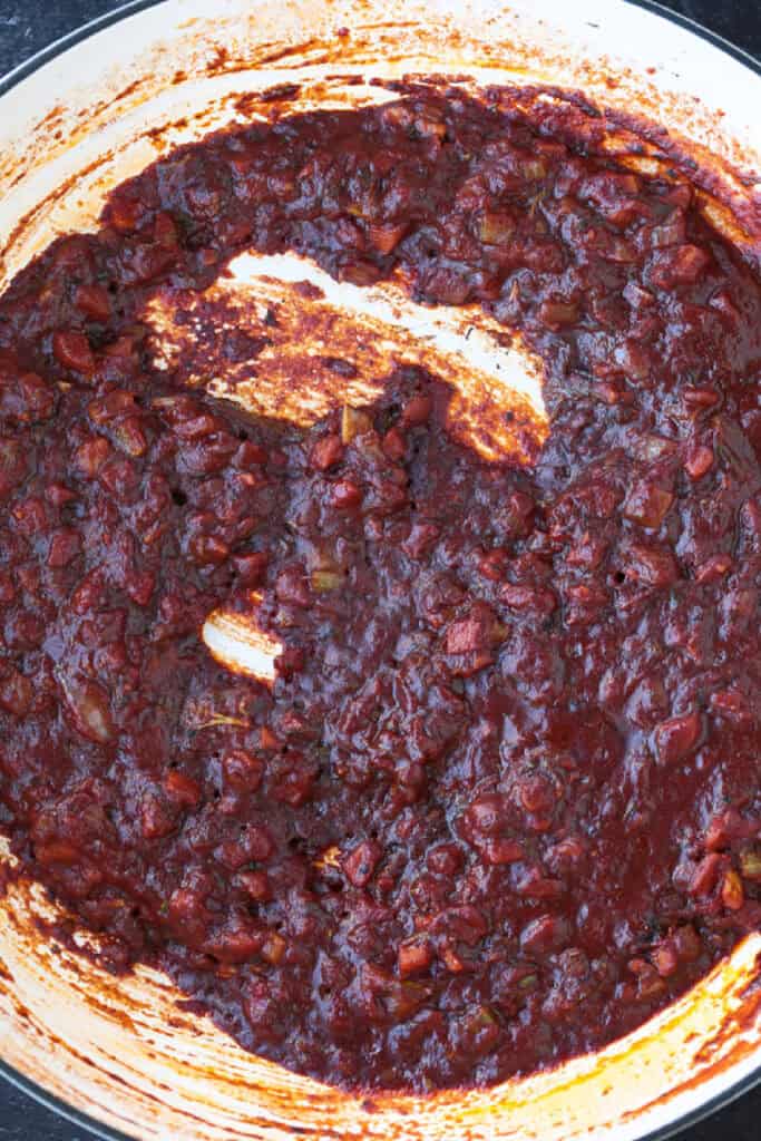 red wine and tomato sauce cooked down in a pot