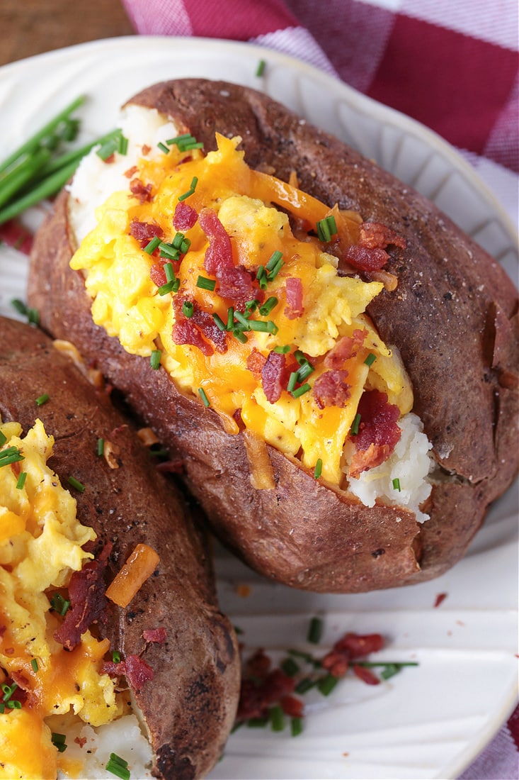 baked potatoes stuffed with eggs, cheese and bacon