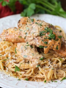 chicken lazone on a bed of spaghetti