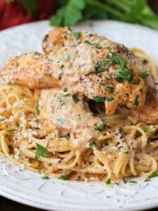 chicken lazone on a bed of spaghetti
