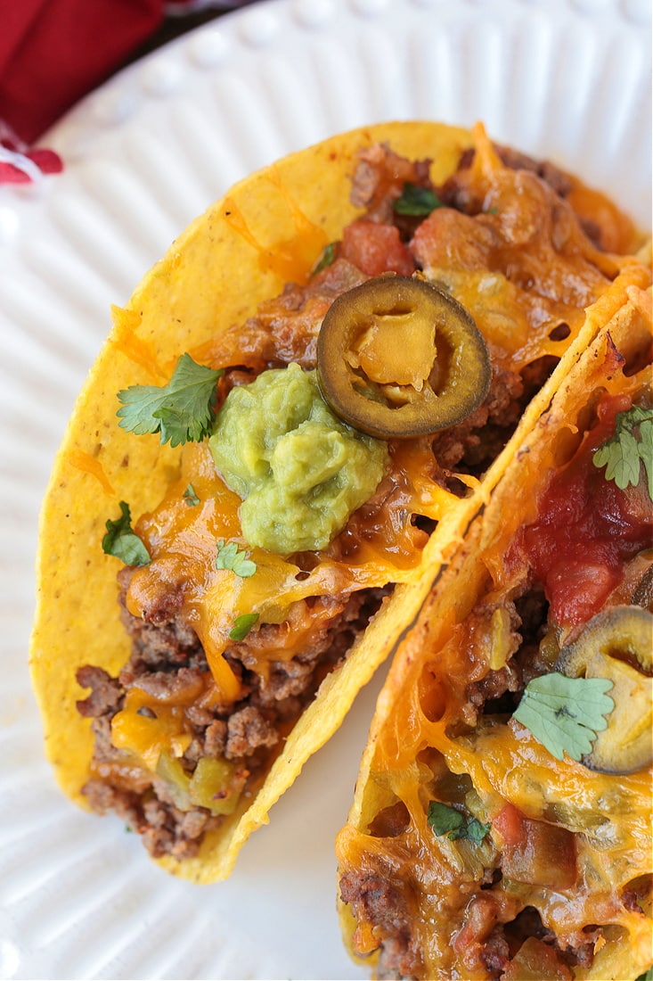 two baked tacos on a plate