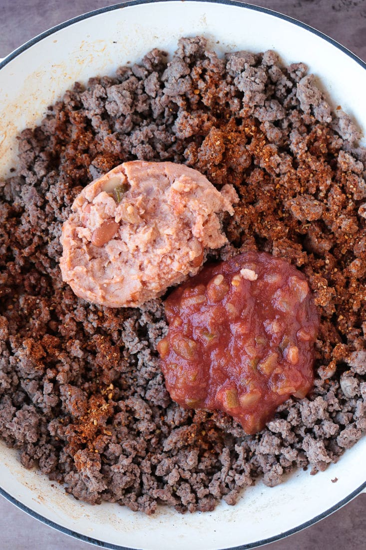 ground beef with refried beans and cheese