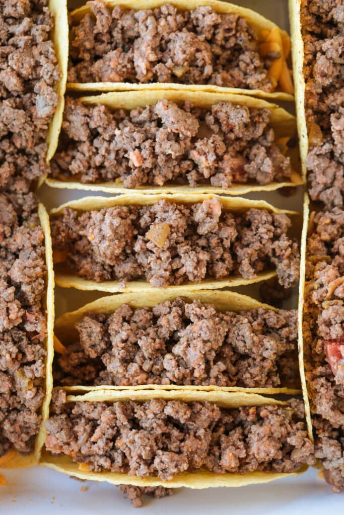Kick up taco night with these addicting, crispy Baked Tacos! Super easy to make for parties or every day dinners, and everyone loves them! ground beef in taco shells