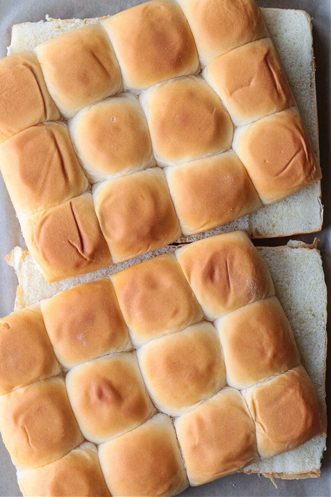 slider buns cut in half on sheet pan