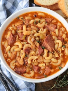 pasta fazool in a bowl with bread on the side