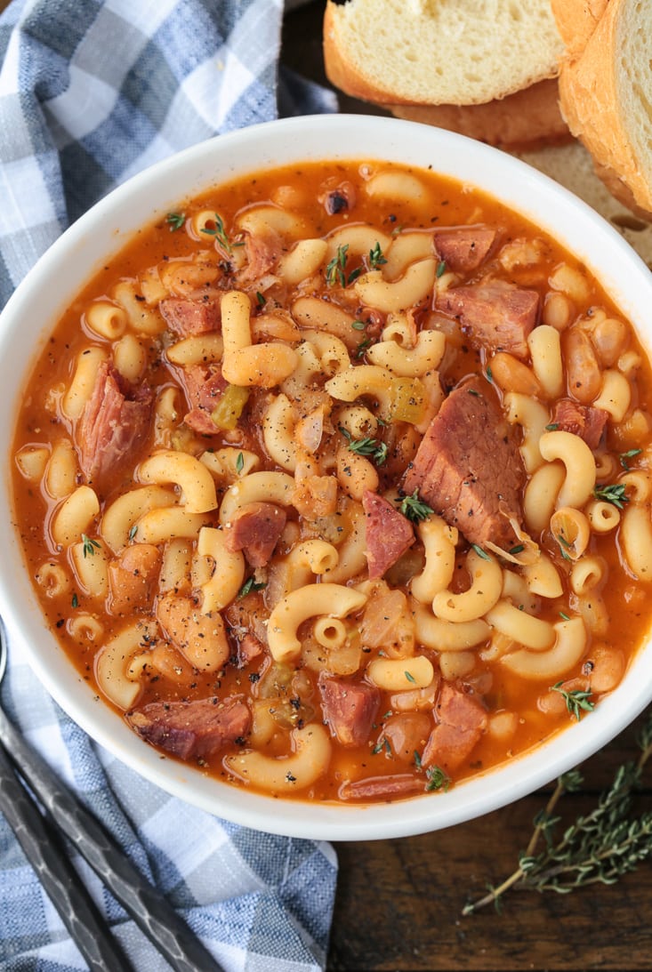 pasta fazool in a bowl with bread on the side