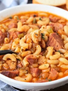 spoon in a bowl of pasta fagioli