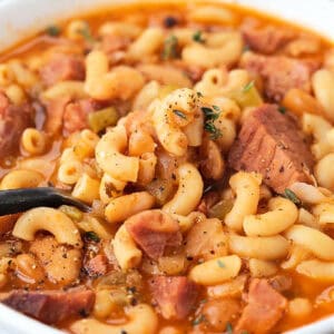 spoon in a bowl of pasta fagioli