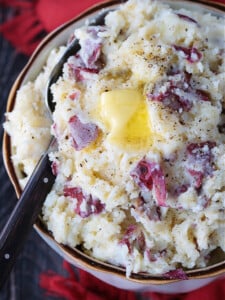 red skin mashed potatoes in bowl with butter