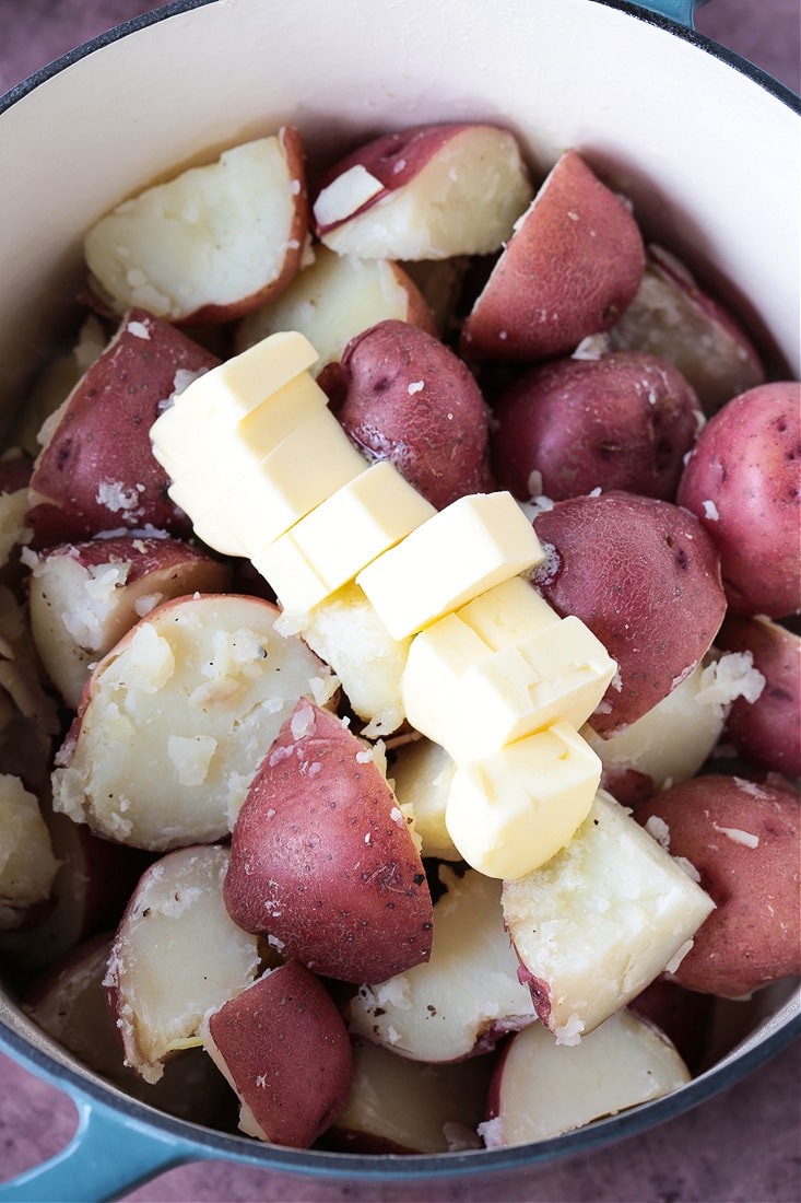 potatoes in a pot with butter