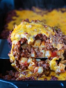 ground beef casserole with potatoes and cheese on top