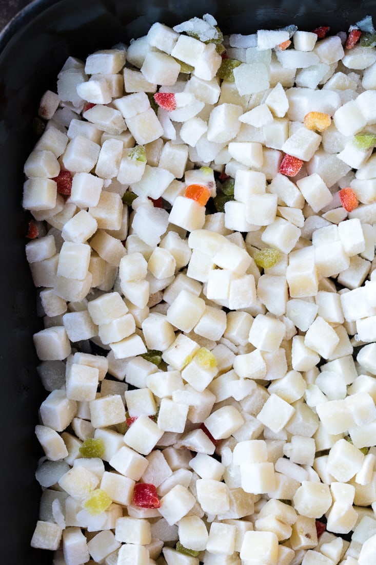 frozen diced potatoes in baking dish